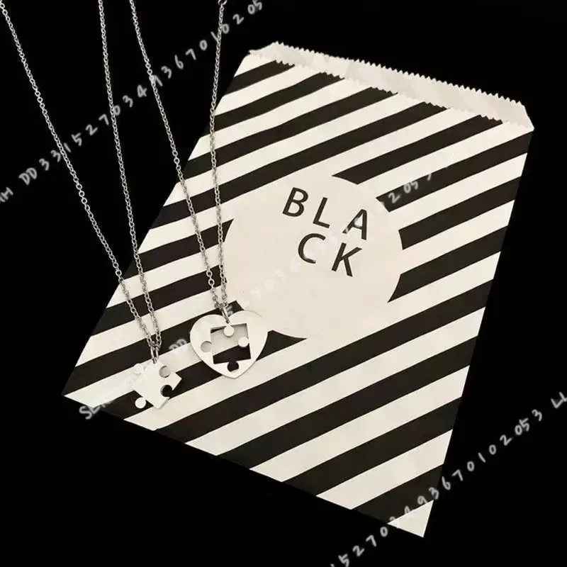 2-delige set eenvoudige puzzel - Magnetic Couple Matching Necklaces recensie en prijs